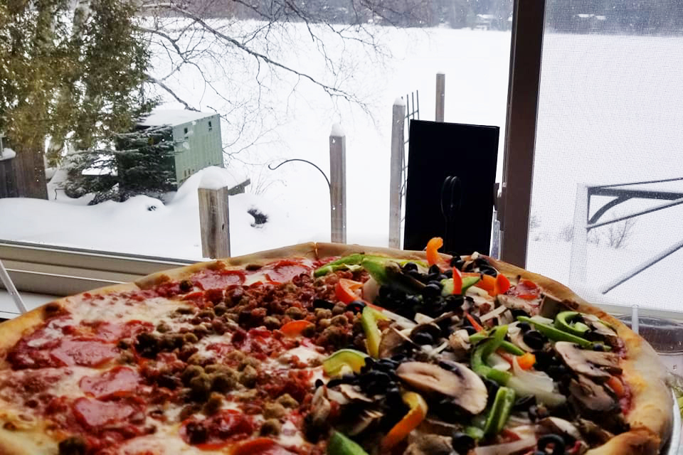  Ere's Pizza A pizza and Mirror Lake Things to Do in Lake Placid on a Winter Vacation Status message